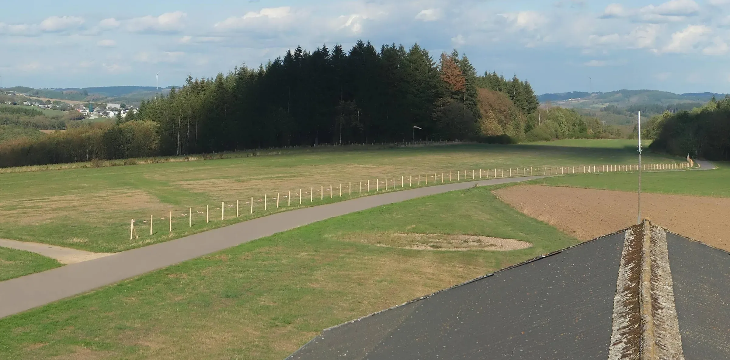 The fenced-off work area running alongside the runway at Noertrange airfield